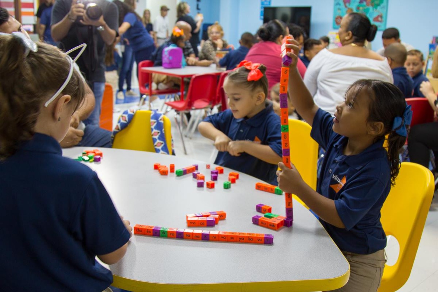 Students play with building blocks. Students play with building blocks.