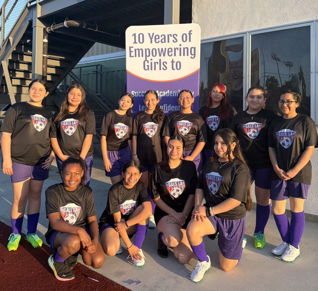 GALS soccer team poses for a photo in uniform at their new campus.