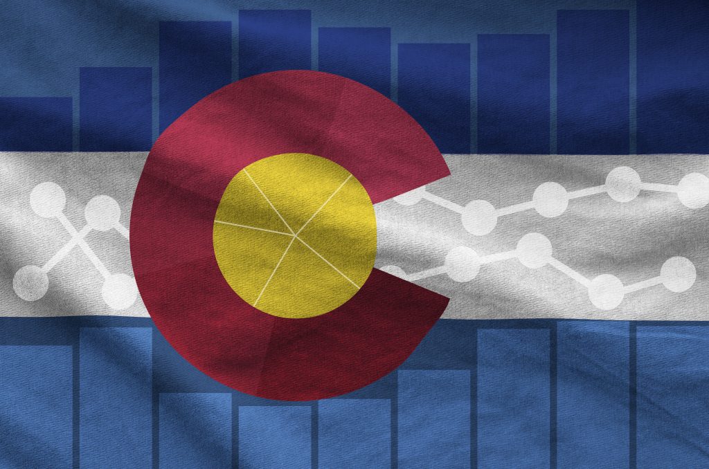 Colorado's state flag overlayed with data illustrations